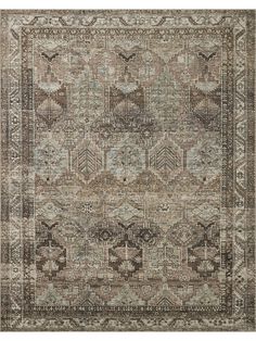 an antique rug with many different colors and patterns on the carpet, including beiges, browns