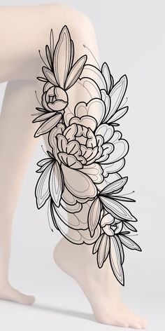 a woman's legs with flowers drawn on them