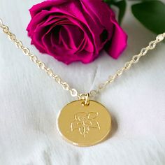 This Birth Month Flower Pendant Necklace is the ideal gift to celebrate a special birth month. With its elegant flower design, it is a thoughtful way to show your loved ones how much you care. Consider giving this unique piece of jewelry as a token of your affection. Material: 14K gold filled and plated Chain: 14K gold filled 16.5” Rolo chain Pendant: 14K gold plated hand stamped flower Lead and nickel free Delivered in a soft protective jewelry pouch and gift box Crafted in the USA Ships from M Yellow Gold Charm Necklace With Flower For Wedding, Anniversary Medallion Necklace With Flower Charm, 14k Gold Birth Flower Jewelry For Mom, Yellow Gold Flower Pendant Charm Necklace For Mother's Day, Yellow Gold Flower Pendant Necklace For Mother's Day, Gold Flower Charm Necklace For Anniversary, Gold Charm Necklace With Flower For Anniversary, Medallion Necklace With Flower Charm For Anniversary, Mother's Day Jewelry With Birth Flower Medallion