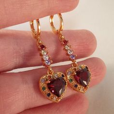 Garnet And Gold Jewelry, Ruby Gold Jewellery, Elegant Red Heart-shaped Earrings, Valentine's Day Fine Jewelry Heart Dangle Earrings, Red Heart-shaped Cubic Zirconia Earrings, Valentine's Day Cubic Zirconia Dangle Heart Earrings, Valentine's Day Cubic Zirconia Heart Dangle Earrings, Valentine's Day Heart Gemstone Earrings, Red Dangle Heart Earrings For Anniversary