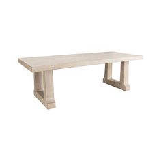 a white bench sitting on top of a wooden table