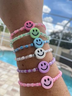 Hand-made in sunny Florida! The goal of these colorful bracelets is to make you smile and brighten your day when you look at them! Surprise your daughter, friend, Mom, etc. with this feel good bracelet! It comes in the following colors - purple, green, blue, pink (light pink smiley or dark pink smiley), & white. Fun Green Beaded Bracelets For Friendship, Fun Green Friendship Bracelets With Round Beads, Fun Green Round Beads Friendship Bracelets, Casual Rainbow Beaded Bracelets For Friendship, Casual Rainbow Beaded Friendship Bracelets, Green Fun Friendship Bracelets With Colorful Beads, Fun Green Friendship Bracelets With Colorful Beads, Fun Green Friendship Bracelet With Colorful Beads, Fun Blue Bracelets For Gifts