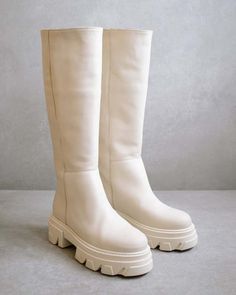 Functionality meets style in this tall boot with a chunky sole and slight elevation.    product type: high boot    platform height: 5 cm    material: leather    color: off-white    made in spain Elevation Details, Lug Boots, High Leather Boots, Tall Boot, Sustainable Fashion Brands, Stylish Boots, Beautiful Boots, White Boots, Carrie Bradshaw