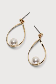 You won't have to dive to depths of the ocean to capture the beauty of the Lulus Truly a Treasure Gold Pearl Teardrop Earrings! These dainty gold-toned teardrop-shaped hoop earrings are adorned with a faux pearl focal. Post backs. 1. 25" Long. 80% Brass, 20% Acrylic. Imported. Lulus | Truly a Treasure Gold Pearl Teardrop Earrings. Treasure Gold, Gold Teardrop Earrings, Pearl Teardrop Earrings, Teardrop Earrings Gold, Earrings With Pearls, Classy Earrings, Wedding Day Gifts, Gold Pearl Earrings, Accessories Jewelry Earrings