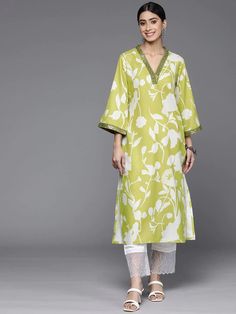 Get ready to be the center of attention with this quirky Lime Green Cotton Printed Kurta. Featuring sparkling sequin detailing, this kurta is perfect for adding some fun and playfulness to any outfit. The soft cotton fabric guarantees ultimate comfort while the vibrant lime green color will make you stand out in the crowd. Add a touch of spunk to your wardrobe with this unique kurta. No. of pieces - 1 piece. Color - Lime Green. Fabric - Cotton. Washing Instructions - Dry Clean. Bollywood Style Kurta With Gota Work For Spring, Spring Green Sets With Gota Work, Green Sequin Sets For Spring, Embellished Straight Kurta For Summer, Spring Party Kurta With Mirror Work, Spring Embellished Straight Kurta, Festive Spring V-neck Kurta, Green Sequined Straight Kurta, Embellished Cotton Sets For Eid