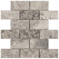 a white and gray marble tile wall