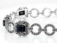 12.60ctw Rectangular Octagonal Black Spinel With Round Marcasite Sterling Silver Toggle Bracelet. Measures  Approximately 0.25"W. Fold Over Clasp. Formal Adjustable Bracelets With Gemstone Accents, Adjustable Formal Bracelets With Gemstone Accents, Adjustable Gemstone Accents Bracelets For Formal Occasions, Formal Sterling Silver Bracelets With Gemstone Accents, Adjustable Formal Jewelry With Gemstone Accents, Elegant Silver Octagon Jewelry, Adjustable Jewelry With Gemstone Accents For Formal Occasions, Formal Octagon Bracelet In Fine Jewelry Style, Faceted Bracelet Jewelry For Formal Occasions