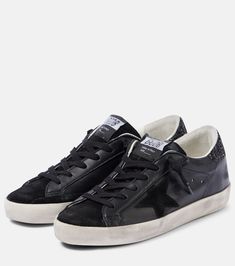 Super-Star leather sneakers in black - Golden Goose | Mytheresa Layered Fashion, Golden Goose Shoes, Golden Goose Deluxe Brand, Super Star, Leather Biker Jacket, Distressed Leather, Golden Goose, Lining Fabric, Shoe Box