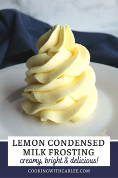 a white plate topped with sliced apples on top of a blue cloth covered tablecloth