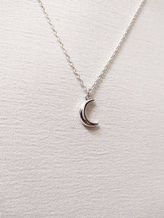 ◆ Necklace with small half moon plated in silver this necklace is very simple and elegant and has an adjustable silver chain the moon size is only 0,629921 inches! ♡ In my shop there are many handmade jewelry for all tastes, come and watch them you are welcome! ♡ Dainty Silver Moon Charm Necklaces, Dainty Silver Moon Charm Necklace, Silver Crescent Sterling Silver Charm Necklace, Dainty Silver Moon Shaped Jewelry, Silver Moon-shaped Clavicle Chain Charm Necklace, Silver Dainty Moon Charm Necklace, Silver Crescent Moon Phase Charm Necklace, Silver Half Moon Charm Necklaces, Silver Moon Charm Necklace With Adjustable Chain