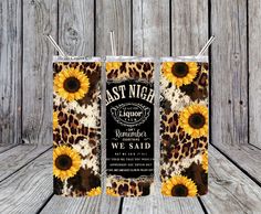 two sunflowers are in front of a card holder with the words, ast night