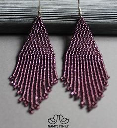 These purple beaded earrings are made of high-quality Czech beads and strong synthetic thread. They are elegant, fashionable, and highly versatile, suitable for everyday wear. Features: Sterling silver components Color: purple. This item is currently in stock. You must be completely satisfied. If you find merchandise unsatisfactory for any reason, return it within 10 days and your money will be refunded without questions. These earrings in gold color https://www.etsy.com/listing/660046267/gold-b Purple Beaded Earrings, Evening Earrings, Animal Print Earrings, Beadwork Earrings, Ombre Earrings, Earrings Chandelier, Beaded Beads, Purple Beaded, Buy Earrings