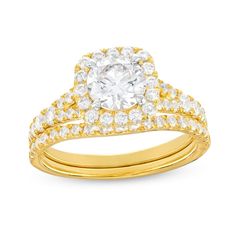 Embrace the bliss in every moment of your love story with this round lab-created diamond cushion-frame bridal set in 14K gold. Crafted in 14K gold The engagement ring showcases a 1 ct. certified round lab-created diamond boasting a color rank of I and clarity of Si2. Lab-created diamonds line the cushion-shaped frame and the subtly split shank. Completing the look, the contoured wedding band shimmers with lab-created diamonds. Includes certification card This bridal set shines with 1-7/8 cts. t. Dazzling Wedding Ring With Halo Setting, Cubic Zirconia Bridal Set With Diamond Cut, Dazzling Halo Setting Wedding Ring, Cushion Cut Halo Diamond Wedding Ring, Elegant Gold Bridal Sets With Halo Setting, Wedding Lab Grown Diamond Cut Ring, Wedding Ring With Brilliant Cut Lab Grown Diamond, Cubic Zirconia Round Cut Bridal Sets For Marriage, Wedding Diamond Ring With Cushion Cut