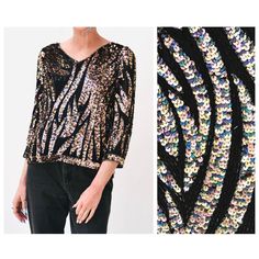 "Super Stunning sequin and beaded top She features: * Silk body fully embellished with Iridescent gold/bronze/pink/green sequins and black seed beads  * Graphic sequin and beaded design * 3/4 sleeves * Angled hem  * slip on style * Such a stunning piece!  Brand Zimble Size Small, fits like a small/medium 100% silk with rayon lining Great vintage condition Bust 40\" Bottom opening 41\" Body length from Shoulder seam  23\"  Sleeve length 19\" All measurements are given in full. Thank you for visiting Hooked On Honey, and remember you can never look too fabulous!! Go Green! Visit the shop  https://www.etsy.com/shop/Hookedonhoney ** twitter | hookedonhoney ** pinterest | hookedonhoney ** Instagram | hookedonhoneyvintage" Sequined V-neck Tops For Fall, Metallic Long Sleeve Top With Sequins, Festive Sequined V-neck Top, Vintage V-neck Party Blouse, Vintage V-neck Blouse For Party, Festive V-neck Sequin Top, Disco Style Embellished Evening Tops, Disco Style Embellished Tops For Evening, V-neck Glitter Top For Party