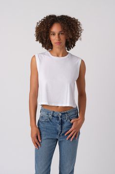 AMO Sleeveless Babe Tee in White Cotton Cropped Hem T-shirt For Summer, Relaxed Fit Cropped T-shirt For Summer, Casual Cropped Tank Top For Everyday, Basic Spring Crop Top, Casual Slightly Cropped Tank Top For Summer, Casual Slightly Cropped Summer Tank Top, Boxy Fit Cropped Shirt For Summer, Spring Relaxed Fit Crop Top Tank Top, Basic Boxy Fit Crop Top For Summer