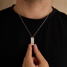 💎 This personalized bar necklace is the perfect blend of elegance and masculinity, designed to be a timeless piece for any man. Handcrafted from 925 sterling silver, this necklace is available in four striking finishes: silver, rose gold, black, and gold, offering a choice that complements any style. ♥️ With an adjustable length between 16 and 26 inches, this necklace can be customized to your preferred fit. Choose from 6 unique font styles to personalize the front with initials, names, or meaningful words. On the back, you can add a special touch by engraving coordinates, a message in your own handwriting, or a symbol like a heart or any other design that holds personal significance. 🖤 Whether you're commemorating a special place with engraved coordinates or gifting a loved one with a p Minimalist Sterling Silver Necklace For Father's Day, Minimalist Rectangular Pendant Necklace For Father's Day, Father's Day Minimalist Rectangular Pendant Necklace, Minimalist Rectangular Pendant Jewelry For Father's Day, Minimalist Dog Tag Necklace For Father's Day, Father's Day Sterling Silver Necklace With Rectangular Pendant, Initial Tag Necklace, Personalized Bar Necklace, Unique Font