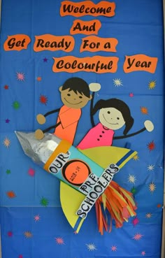 a welcome and get ready for a colorful year bulletin board with two children on a rocket ship