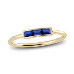 A sleek row of three baguette-cut natural blue sapphire gemstones modernizes this striking bar style ring from the Juliette Maison™ collection. Fashioned in 10K yellow gold, the bezel set stones make a bold but elevated statement with its minimal design. Modern Baguette Cut Sapphire Ring, Natural Stone Jewelry Diy, Natural Stone Earrings Handmade, Stone Jewelry Necklace, Sapphire Jewelry Set, Hematite Jewelry, Diamond Solitaire Earrings, Stone Bead Jewelry, Jared The Galleria Of Jewelry