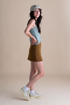 Introducing the Elsa Skort: the perfect blend of shorts and skirt for summer adventures. Crafted from organic French Terry cotton, it offers comfort and breathability. With its casual mid-thigh length and non-elastic waistband, it's the ideal choice for those seeking effortless style and freedom of movement. Short Flowy Skirt With Built-in Shorts, Relaxed Mini Skirt With Built-in Shorts, Cotton Mini Skirt With Built-in Shorts, Casual Mini Skirt With Built-in Shorts And Relaxed Fit, Summer Cotton Skort With Built-in Shorts, Flowy Bottoms With Built-in Shorts For Day Out, Cotton Skirt With Built-in Shorts, Flowy Skort With Built-in Shorts, Mini Skirt With Built-in Shorts For Day Out