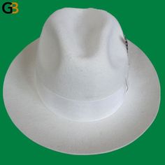 This fedora hat is beautifully crafted in white color with intricate detailing. For adding beauty to your fashion, this grand hat is the best choice. This pulchritudinous hat that is crafted of superb quality wool material will be your casual occasion partner. An accessible cost, high-quality hat that suits both men and women!

Specifications
Item Type: Fedoras
Department Name: Adult
Pattern Type: Solid
Gender: Unisex
Style: Formal
Material: Wool
 Shipping

This product ships from China in 3 to Classic White Adjustable Hat, Classic Adjustable White Hat, White Adjustable Panama Hat For Formal Occasions, Classic White Hat With Short Brim, Classic White Hat Bands For Formal Events, White Flat Brim Panama Hat For Kentucky Derby, White Fitted Panama Hat With Curved Brim, White Fitted Fedora With Brim, Classic White Flat Brim Hat Bands