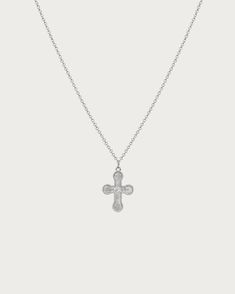 Exquisite in every detail, this cross necklace is the epitome of timeless elegance. Designed to elevate the daily. This cross pendant is a must-have for the style-savvy individual who seeks to infuse their daily look with a touch of sophistication and refinement Materials: brass plated in rhodium Measurements: 370mm/14.57"in length, 70mm/2.8" in extension length Koleen Diaz, Small Cross Necklace, En Route Jewelry, Mini Cross, Heart Hair, Hard Metal, Style Savvy, Zimbabwe, Cross Pendant Necklace