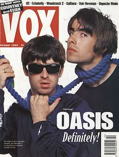 two men with sunglasses on the cover of vox magazine, one holding a rope around his neck