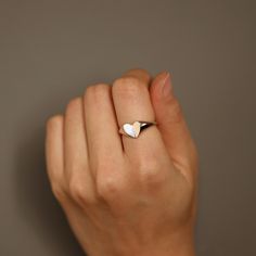 Heart Ring, 14K Solid Gold Heart Ring, Angled Heart Ring, Minimalist Ring, Bold Gold Ring, 14K Gold Bold Ring, Layering Ring, Stacking Ring ≫ Product Details ◈ Handmade / Handcrafted Fine Jewelry ◈ Face Width: 8.5mm ◈ Gold Weight: Approx. 2.7g (Based on size 7) ◈ Metal: Solid 14K Gold ◈ Gold Color: White gold, Rose gold, Yellow gold ≫ Please read our FAQ below for more detail. Minimalist Stackable Rings With Heart Charm For Promise, Minimalist Heart Shaped Stackable Promise Rings, Minimalist Stackable Rings With Heart Charm For Anniversary, Minimalist Stackable Heart Promise Ring, Minimalist White Gold Heart Ring For Wedding, Minimalist White Heart Ring For Anniversary, Minimalist Simple Design Heart Promise Ring, Minimalist Stackable Rings With Heart Charm, Minimalist Sterling Silver Stackable Rings With Heart Charm