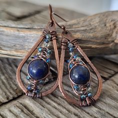 Sparkle Beaded Dangle Earrings -handcrafted unique design with a bohemian feel -made of solid patina copper -featuring natural lapis lazui stone,  and blue faceted glass beads for pretty sparkle -woven wire wrap detail -classic teardrop shape -lightweight and comfortable for everyday wear or that special occasion -great gift idea for the woman who loves artisan jewelry -copper plated brass ear hooks - nickel free, lead free and cadmium free Size:  2 inches long (measurement includes the ear hook Beaded Boho Jewelry, Patina Copper, Wire Wrap Jewelry, Wrap Earrings, Wrapped Earrings, Blue Lapis Lazuli, Wrap Jewelry, Stone Wrapping, Jewelry Hand