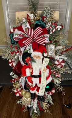 a christmas tree with santa clause and decorations