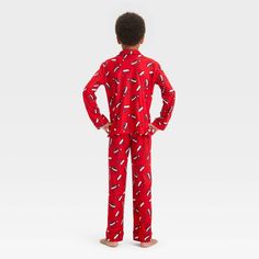 For all-night comfort, your child will love wearing this 2-Piece Long-Sleeve Coat Pajama Set from Cat & Jack™ to bed. This pajama set includes a long-sleeve button-down pajama shirt and pull-on pajama pants, both crafted from 100% recycled polyester fabric for all-night comfort. Best of all, the pajama pants are designed with comfort elastic for a secure fit, while both pieces feature the same print for coordinated flair. Cat & Jack™: Designed for all children so you can trust it's made for your Casual Christmas Sleep Sets, Casual Christmas Sleepwear Sets, Casual Christmas Sleepover Sets, Casual Long Sleeve Christmas Sets, Casual Holiday Sets For Pajama Party, Casual Cotton Holiday Sleepwear, Festive Winter Cotton Sleepwear, Casual Holiday Festive Sleepwear, Casual Red Christmas Sleepwear