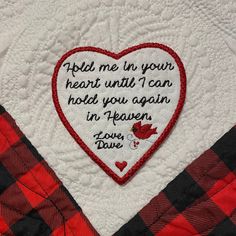 a red and black checkered blanket with a heart on it that says, hold me in your heart until i can hold you again in heaven