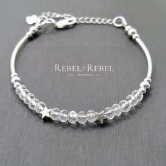 Handmade in the UK 4mm x 3mm Graduated Faceted Clear Quartz Rondelle Beads 25mm 925 Sterling Silver Noodle Beads 3mm and 4mm 925 Round and Star Shaped Sterling Silver Beads  5cm Sterling Silver Extender Chain Gemstones are 100% genuine This simple Clear Quartz bracelet is truly stunning and will blend seamlessly with any outfit.  It is versatile and can be worn alone or stacked with others.   About Clear Quartz: Clear Quartz is associated with crown chakra and all zodiac signs.  A stone that is Sterling Silver Stacking Bracelets, Clear Quartz Bracelet, Beaded Leather Bracelet, Bracelet Minimalist, Birthstone Bracelet, Silver Bead Bracelet, April Birthstone, Gemstone Beaded Bracelets, Birthstone Bracelets