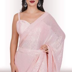 Are you ready to shine? Elevate your style with our Ready-Made Sequin Saree in the enchanting Blush shade. Crafted from high-quality georgette fabric adorned with mesmerizing sequin work, this saree promises a lavish and effortless style upgrade. It effortlessly drapes in less than a minute, ensuring you're ready to dazzle in no time! 🤩😍💃With its exquisite design and easy-to-wear nature, this Ready-Made Sequin Saree makes a statement without the need for elaborate draping or styling. The sequ Reception Outfits, Sequin Saree, Sari Blouse, Style Upgrade, Georgette Fabric, Blush Color, Ready Made, Exquisite Design, Indian Outfits