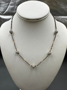 Single-line black diamond bead chain with CZ stone balls Handmade Jewelry  Silver-plated jewelry One gram of gold jewelry  For more products please visit  Globusfashions.com Official Website globusfashions.com 🌸 S H O P . M O R E . S T Y L E S  🌸 https://www.etsy.com/shop/Globusfashions Necklaces -  https://www.etsy.com/shop/Globusfashions?section_id=18712263 Bracelets - https://www.etsy.com/shop/Globusfashions?section_id=18969767 Pendant Sets - https://www.etsy.com/shop/Globusfashions?section Gold Necklaces With Black Beads For Party, Black Jewelry With Beaded Chain And Round Beads, Black Metal Necklaces For Wedding, Gold Pearl Necklace With Black Round Beads, Elegant Black Metal Necklace For Weddings, Silver Necklaces With Round Beads For Celebration, Gold Metal Beaded Necklaces With Black Beads, Gold Metal Beaded Necklace With Black Beads, Gold Metal Necklace With Black Beads