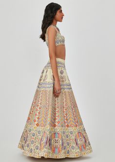 Beige kasab satin multicolor printed lehenga and blouse with heavy embellishment. Digital Print Dupatta For Navratri Reception, Digital Print Dupatta For Reception At Navratri, Digital Print Dupatta For Reception And Navratri, Navratri Reception Dupatta With Digital Print, Silk Sharara With Digital Print For Navratri, Floor-length Lehenga With Printed Motifs For Wedding, Silk Digital Print Sharara For Navratri, Reception Lehenga With Printed Motifs Semi-stitched, Multicolor Digital Print Lehenga For Reception