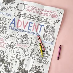 an adult coloring book on a pink background with crayons