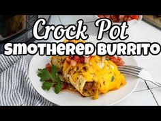 crock pot smothered burrito on a white plate