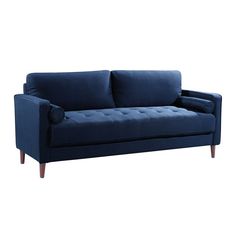 a blue couch sitting on top of a white floor