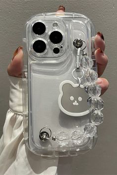 someone is holding up their phone case with an animal on it