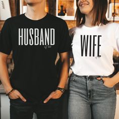 "Husband and Wife shirts, Husband shirt, Wife shirt | Honeymoon tshirts, Just Married shirts | Wife tee, Husband tee, Wedding gift, Newlyweds Hello! Welcome to my shop, I am so happy to see you here. My shop's priority is to provide a little extra sunshine in your day. I want to ensure YOU feel seen, heard, and welcome. Please contact me if you have any questions at all. 🌸HOW TO ORDER Check the photos for all sizing and color options Select your size and color from the drop-down menus. WIFE: White and Pink will have black lettering, Black will have white lettering HUSBAND: White will have black lettering, Black and Grey will have white lettering Choose your quantity. Click \"ADD TO CART\" Click \"PROCEED TO CHECKOUT\"  Your order is off to production!  🌸SIZING These unisex T-shirts are t Couples Crew Neck T-shirt For Wedding, Couples Wedding T-shirt With Crew Neck, White Custom Text Top For Wedding, White Custom Text T-shirt For Weddings, White Letter Print Shirt For Wedding, White Short Sleeve Bride T-shirt, Bride's White Short Sleeve T-shirt, Couples' White T-shirt For Wedding, Husband And Wife Shirts