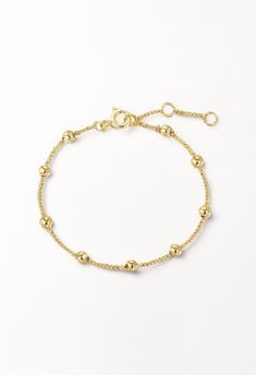 Micro Bead & Chain Bracelet Luxury Bracelets With Delicate Chain, Elegant 14k Gold Bangle Charm Bracelet, Classic Gold Bracelet With Adjustable Chain, Adjustable Delicate White Gold Bracelet, Elegant Beaded Chain Jewelry For Gifts, Classic 14k Gold Charm Bracelet, Elegant 14k Gold Round Charm Bracelet, Classic 14k Gold Round Charm Bracelet, Classic Round 14k Gold Charm Bracelet