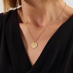 Wear a symbol of divine protection with the Saint Christopher Coin Necklace. Featuring a finely detailed depiction of Saint Christopher, the patron saint of travelers, this necklace serves as a protective talisman and a stylish accessory, offering a unique blend of faith and fashion for everyday wear. - Made in 14k Solid Gold - Pendant: 15.83X15.83 mm / 0.623x0.623 inches - Thickness: 0.72 mm / 0.028 inches - This product comes with iconic Norm Jewels gift box Protective Talisman, Divine Protection, Saint Christopher, The Saint, Coin Necklace, Signet Ring, Stylish Accessories, Ring Bracelet, Rings Statement