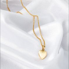 Perfect as a Valentine's gift or a heartfelt present for someone special, this love pendant is sure to make a lasting impression. Wear it alone for a subtle statement or layer it with other favorites for a trendy look. Show your love and appreciation with this beautiful 14k gold 3D heart necklace. *Free Express International Shipping *Free returns within 14 days from the order date. *14K solid gold chain is included if you select. NEXT BUSINESS DAY SHIPPING! PRODUCT DETAILS *The product is made of 100% 14k Solid Gold and it has a 14K or 585 stamp on item. (We don't sell filled or plated jewelry) *The package includes a gold certificate.  *The product includes 14K solid gold chain. *Every package comes in a gift box. *14K gold indicates that the product is produced from 58% pure gold. *Chai 14k Gold Heart Pendant Locket For Anniversary, Elegant Heart-shaped Necklace With Charms, Elegant Heart Cut Necklace With Charms, Elegant Heart-shaped Charm Necklace, Elegant Heart-shaped Charms Necklace, Elegant Heart Shaped Charms Necklace, Yellow Gold Charms Necklace Keepsake, Dainty Heart Pendant Locket Necklace With Charm, Dainty Heart Locket Necklace With Charm