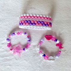 Set Of Three Adorable Pastel Edm Rave Candy Bracelets. Pink, Purple, And Iridescent Beads. Bracelets Glow Under Black Light. Stretchy Elastic. So Cute! Handmade; The One Posted Is The One You Get Ooak; Not Dolls Kill Pink Beaded Kawaii Bracelets, Kawaii Pink Beaded Bracelets, Kawaii Adjustable Pink Beaded Bracelet, Pink Adjustable Kawaii Beaded Bracelets, Adjustable Pink Beaded Bracelets In Kawaii Style, Adjustable Pink Beaded Bracelet In Kawaii Style, Cute Pink Beaded Plastic Bracelets, Kawaii Pink Bracelet For Party, Cute Purple Bracelets For Party