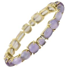 Roberto Coin Shanghai Amethyst Gold Bangle Bracelet features 42 carats of amethyst mounted in a 18k yellow gold. This bracelet has multi-shape prong set amethyst station. It is made in Italy. Estimated Retail $6,000 Roberto Coin Bracelet, Modern Bangle, 18k Gold Bracelet, Modern Bracelets, Yellow Gold Bangle, Diamond Bangles Bracelet, Roberto Coin, Amethyst Gold, 18k Gold Jewelry