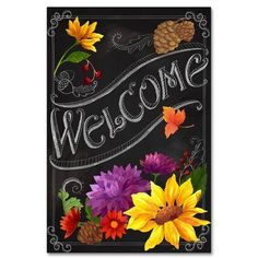 a chalkboard sign that says welcome with flowers and pine cones on the bottom corner