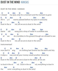 the song dust in the wind is written on a sheet with blue letters and white writing