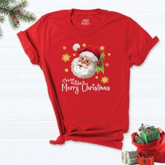 "Santa Claus Shirt, Christmas Shirt, Merry Shirt, Christmas t-shirt, Christmas Gift Shirt, Papa Claus Christmas Tee, Christmas Family Shirt. HI! Welcome to my store, I'm delighted to see you here. My store's main goal is to provide you with premium everyday apparel with the best graphic t-shirts. I see you as a friend, not just a customer. I'm sure you'll love my designs. So, here is a brief description for you to-see-the order-process: 1. Please, Check and Review all Photos. 2. Select Your T-Sh New Year Holiday Crew Neck T-shirt, Christmas Cotton T-shirt, Christmas Cotton T-shirt Gift, Casual Christmas T-shirt As Gift, Red Holiday Shirt For Gift, Red Holiday Shirt Gift, Holiday Red Shirt As Gift, Red Cotton Shirt For Christmas, Christmas Graphic Tee With Short Sleeves