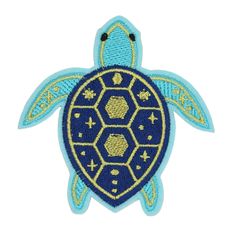 a blue and yellow patch with an image of a turtle on it's back