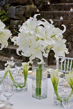 an image of flowers in vases on the table